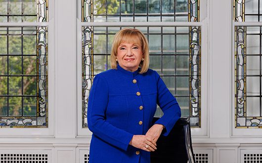 Two photos side by side: one, a portrait of Joe Cacchione; the other, a portrait of Susan Aldridge