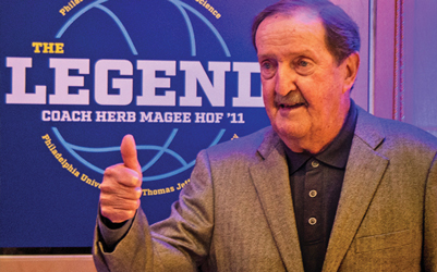 Coach Herb Magee at the naming ceremony giving a thumbs-up