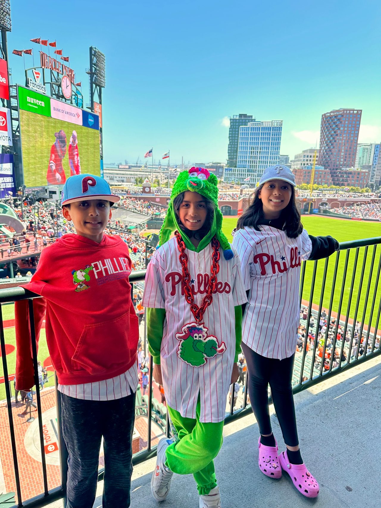 This image shows Nureed Saeed's three children at a Phillies game.