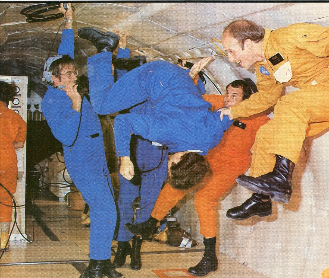 James Bagian, MD ‘77 (far right), floats in space with fellow astronauts.
